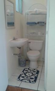 Ванна кімната в lindo apartamento
