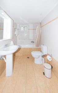 Kúpeľňa v ubytovaní Vithos Apartment