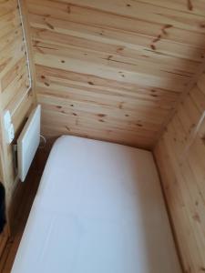 Кровать или кровати в номере Fossatun Camping Pods & Cottages - Sleeping Bag Accommodation