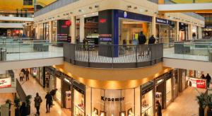 a large shopping mall with people walking through it at Hotel Drei Kronen in Dortmund