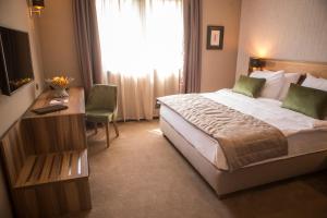Postel nebo postele na pokoji v ubytování A Hoteli - Hotel Slatina