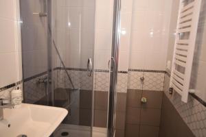 Kúpeľňa v ubytovaní Apartament Rodzinny S10