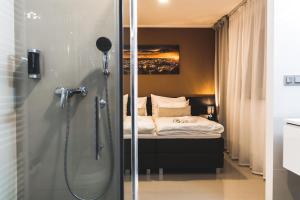 Posteľ alebo postele v izbe v ubytovaní SILESIA Apartment