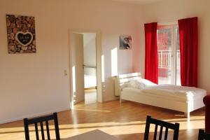 Voodi või voodid majutusasutuse Ferienwohungen - Apartments Satzvey toas