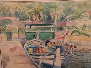 a painting of a boat with palm trees in the background at Hôtel Le Porquerollais in Porquerolles
