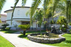 Κήπος έξω από το Hotel Toscano