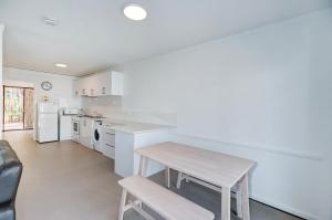
A kitchen or kitchenette at West Beach Lagoon 206 Great Value
