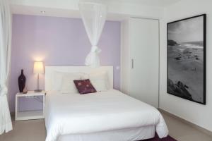 Кровать или кровати в номере Hotel Alcatruz