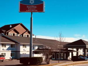 a street sign in front of a hotel room at SureStay Plus Hotel by Best Western Post Falls in Post Falls