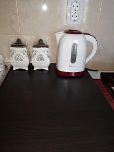 two white toasters sitting on top of a counter at Apartment Bogdan in Banja Koviljača