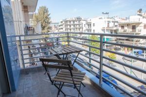 Een balkon of terras bij Lak Peristeri Homes