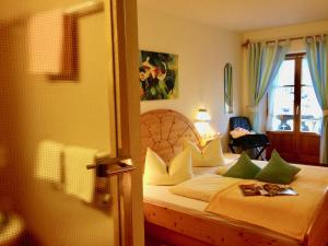Postel nebo postele na pokoji v ubytování Hotel Waltraud Garni