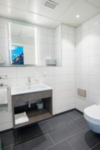 Ein Badezimmer in der Unterkunft Stadthotel Freiburg Kolping Hotels & Resorts