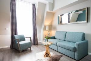 Ein Sitzbereich in der Unterkunft Stadthotel Freiburg Kolping Hotels & Resorts