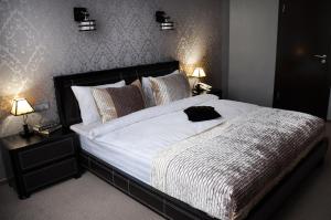 
Кровать или кровати в номере Oasis Hotel
