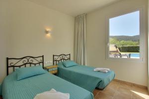 A bed or beds in a room at Casa Peters