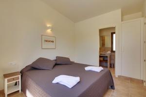 A bed or beds in a room at Casa Peters