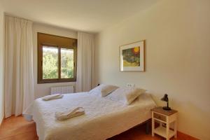 A bed or beds in a room at Casa Peters