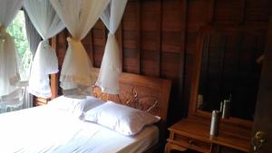 Letto o letti in una camera di Bali Jungle Resort