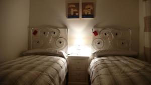A bed or beds in a room at Casa Rural las Burbujas