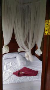 Letto o letti in una camera di Bali Jungle Resort