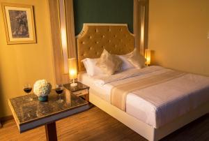 Katil atau katil-katil dalam bilik di Appleton Boutique Hotel Mactan Cebu