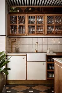 Kuchyň nebo kuchyňský kout v ubytování Hotel Sanders