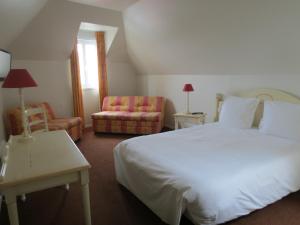 Postel nebo postele na pokoji v ubytování Hotel Côte d'Opale