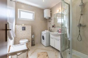 Kúpeľňa v ubytovaní Villa Palanga