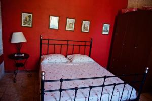 Postel nebo postele na pokoji v ubytování Donna Isabella
