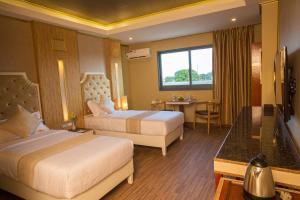 Katil atau katil-katil dalam bilik di Appleton Boutique Hotel Mactan Cebu