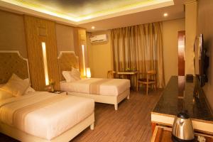 Televisyen dan/atau pusat hiburan di Appleton Boutique Hotel Mactan Cebu