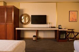 Televisyen dan/atau pusat hiburan di Appleton Boutique Hotel Mactan Cebu