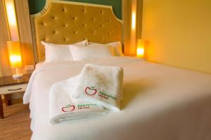 Katil atau katil-katil dalam bilik di Appleton Boutique Hotel Mactan Cebu
