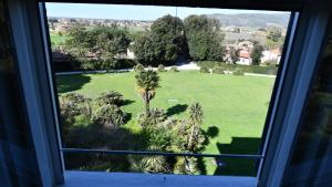 Pogled na vrt u objektu Villa di Corliano Relais all'Ussero ili u blizini