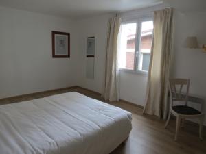 Postel nebo postele na pokoji v ubytování Hotel Côte d'Opale