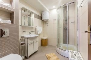 Kúpeľňa v ubytovaní Villa Palanga