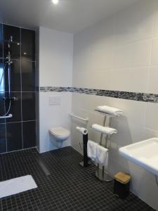 Koupelna v ubytování Hotel Côte d'Opale