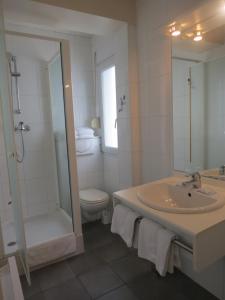 Koupelna v ubytování Hotel Côte d'Opale
