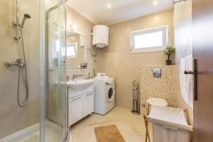 Kúpeľňa v ubytovaní Villa Palanga
