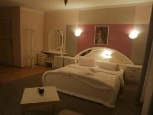 Postel nebo postele na pokoji v ubytování Hotel Passione