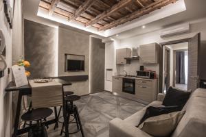 Гостиная зона в DaVinci Apartament near Duomo