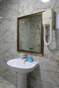 Koupelna v ubytování Hotel Adria