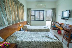 Ένα ή περισσότερα κρεβάτια σε δωμάτιο στο YMCA International House