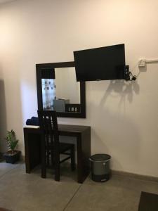 TV a/nebo společenská místnost v ubytování US Motel Colombo + 21 fotografií