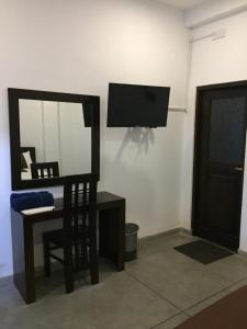 TV a/nebo společenská místnost v ubytování US Motel Colombo