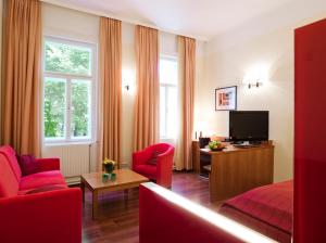 Televiisor ja/või meelelahutuskeskus majutusasutuses Hotel Zipser