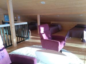 Posezení v ubytování Mustikkakallio Luxury Villa