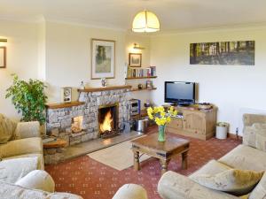 A seating area at High Butterbent Cott 