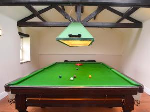 A pool table at Auckland Cottage 